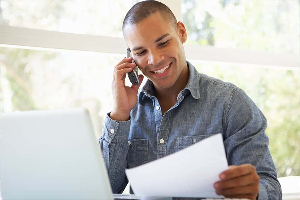 smiling-man-on-phone